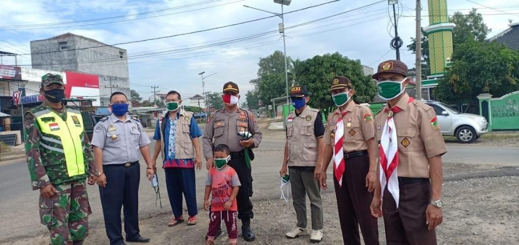 LDII Pringsewu Cegah Penyebaran Covid-19 dengan Bagikan Masker pada Warga